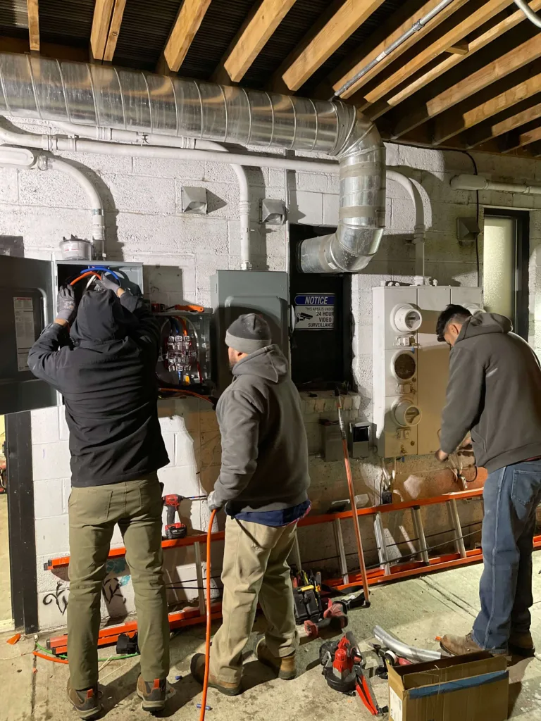 Three Electricians working