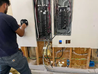 Trusted Electrician working on power box